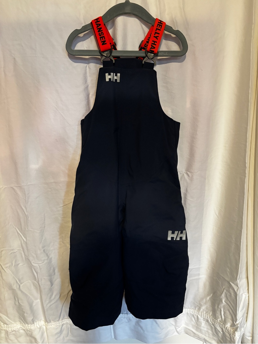 Helly Hansen Navy Kids Snowpants with orange Logo Suspenders